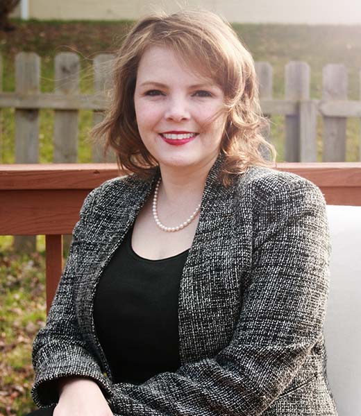 picture of our CEO Amanda Leslie in black blazer